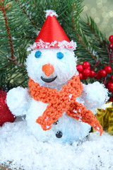 Beautiful snowman and Christmas decor, on bright background