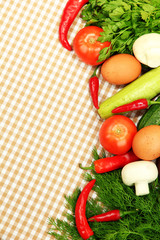 Cooking concept. Vegetables on tablecloth background