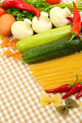 Cooking concept. Groceries on tablecloth background