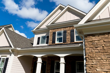 Obraz premium Large residential house roof line and exterior details