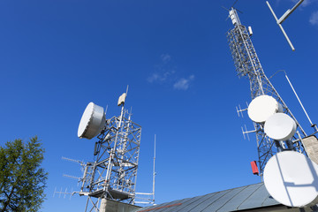 Telecommunication Towers on Blue Sky