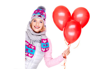 Fototapeta na wymiar Happy american woman with red balloons and banner