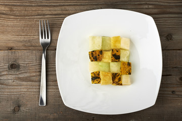 Mediterranean cuisine, melon in cubes.