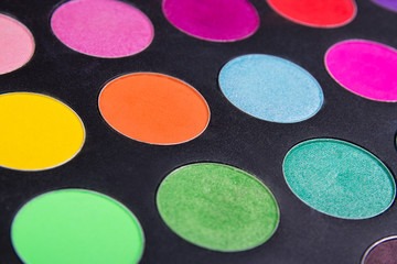 Make-up colorful eyeshadow palettes over black