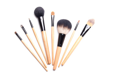 brown make-up brushes isolated on white