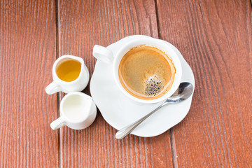 Coffee on grunge wooden background