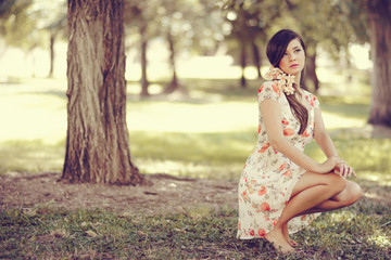 Young beautiful japanese woman with flowers in her hair