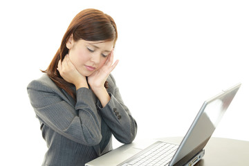 疲れた様子のOL