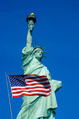 Statue of Liberty and United States flag in New York City