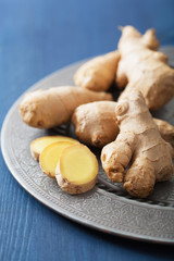 fresh ginger on vintage plate