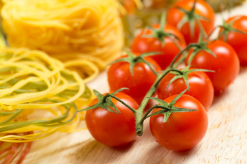 close-up of cherry tomatoes and pasta