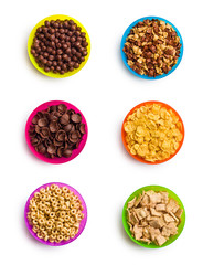 various cereals in colorful bowls