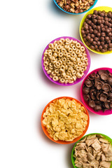various cereals in plastic bowls