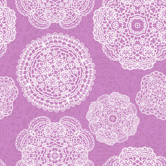 Lace seamless pattern with doilies on violet background