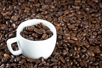 china cup with coffee beans