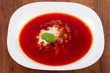 beet soup in white plate