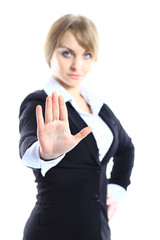 Obraz premium Business woman making stop sign over white, focus on hand