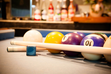 Billiard balls on pool table