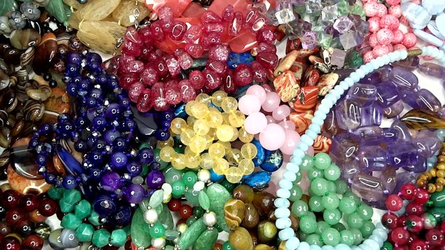 semigem necklaces and beads jewelery as fashion background