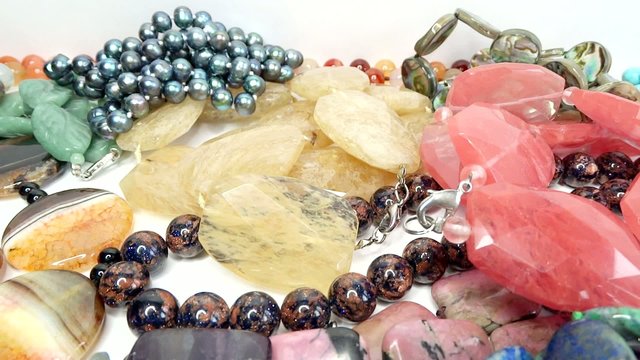 semigem necklaces and beads jewelery as fashion background