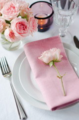 Beautiful festive table setting with roses