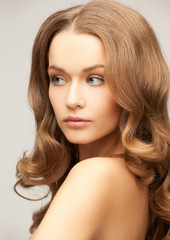 Naklejka premium beautiful woman with long hair