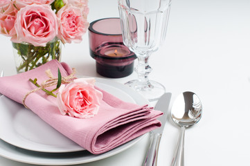 Beautiful festive table setting with roses