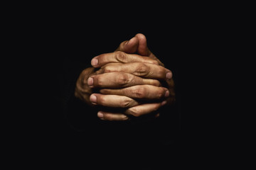 Fototapeta premium Hands crossed in prayer