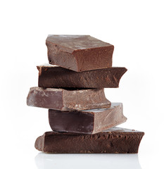 Chocolate pieces on a white background