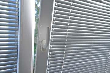 Venetian blinds on window