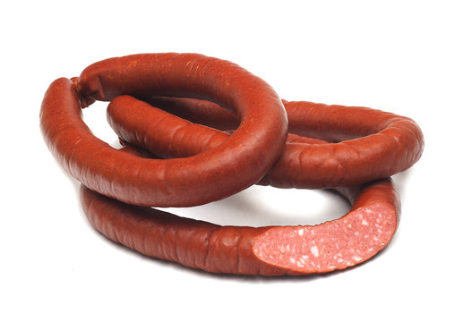 three rings of  smoked sousages with sectionon