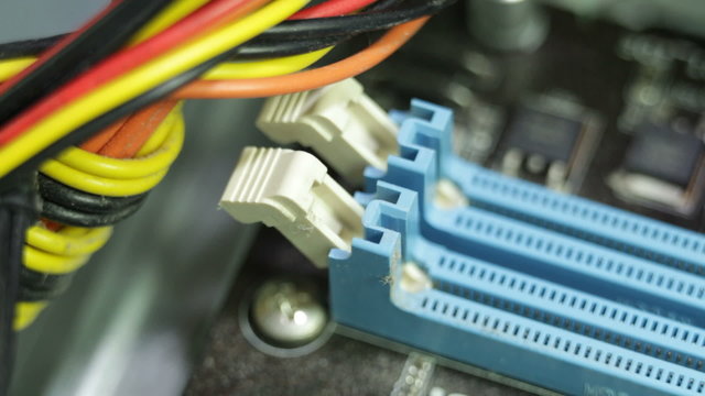 Closeup of RAM memory slots on motherboard PC