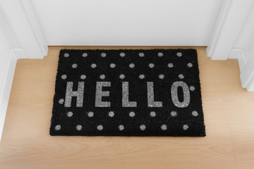 Welcome home doormat with close door