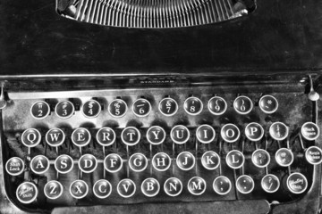 An Antique Typewriter Showing Traditional QWERTY Keys V