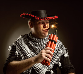 Cowboy mexican firing dynamite by cigar