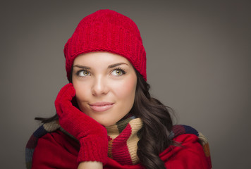 Smiling Mixed Race Woman Wearing Mittens Looks to Side