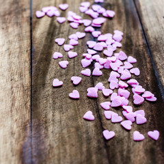 Naklejka na ściany i meble Valentines Day background with candy hearts. Sugar Hearts on wo