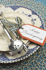 Blue vintage Happy Thanksgving table place setting close up
