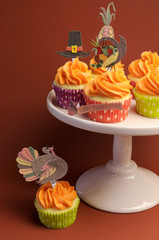 Happy Thanksgiving decorated cupcakes. Vertical.