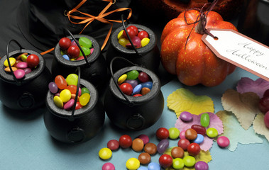 Halloween Trick or Treat candy cauldrons. Close up.