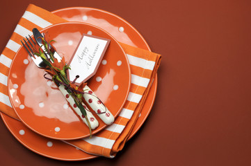 Halloween orange table setting with copy space