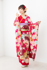 Fototapeta premium Beautiful asian kimono woman on white background