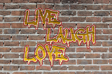 Old dark red brick wall texture  with graffity