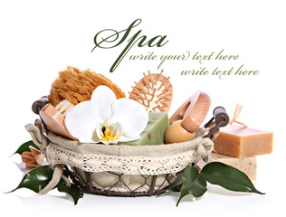 Spa bath kit or sauna toiletries set in basket with orchid
