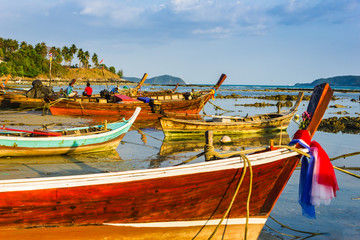 Fototapeta na wymiar Fishing boats on the sea shore in Thailand