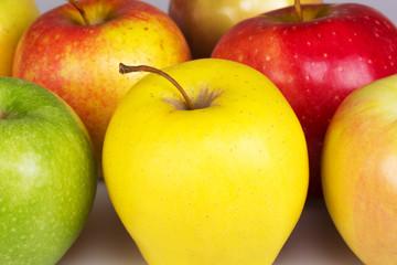 ripe yellow, red, green, pink apple