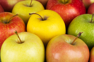 ripe yellow, red, green, pink apple