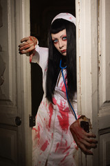 Horror movie. Crazy dead nurse