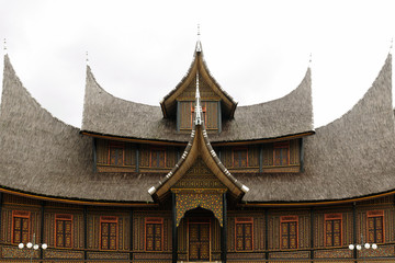 Fototapeta na wymiar Indonesia traditional house on the West Sumatra island