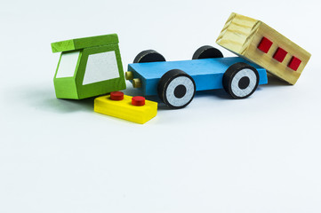 Crushed toy truck on a white background